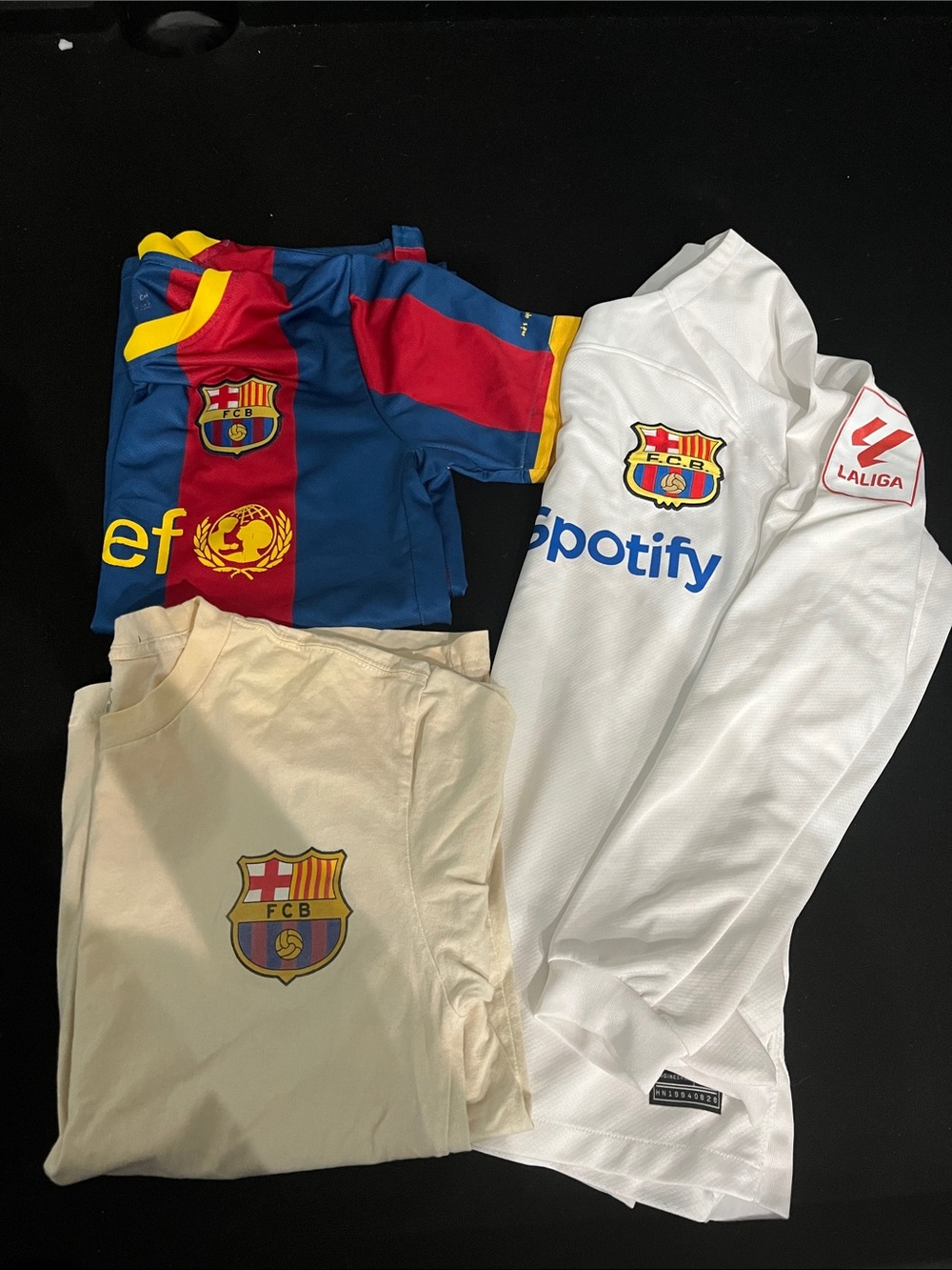 3 Adult FC Barcelona shirts.